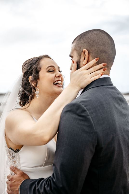 A bride laughing at her groom | Cherished memories studio