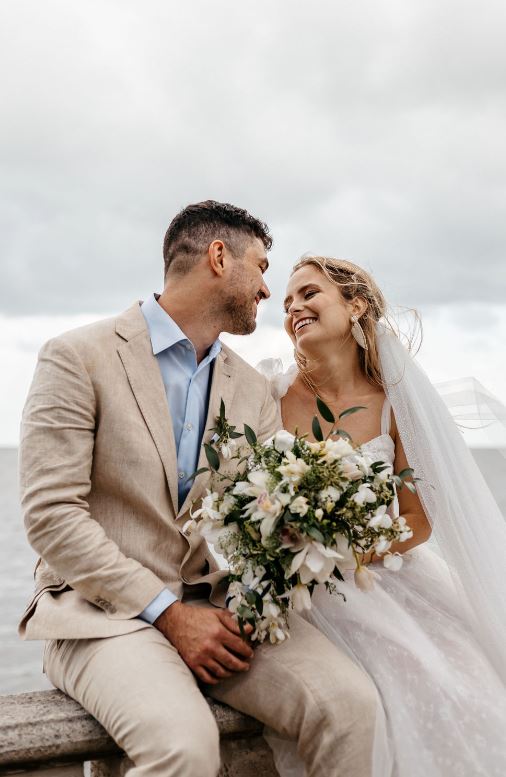 Newly wed smiling at each other | Cherished memories studio