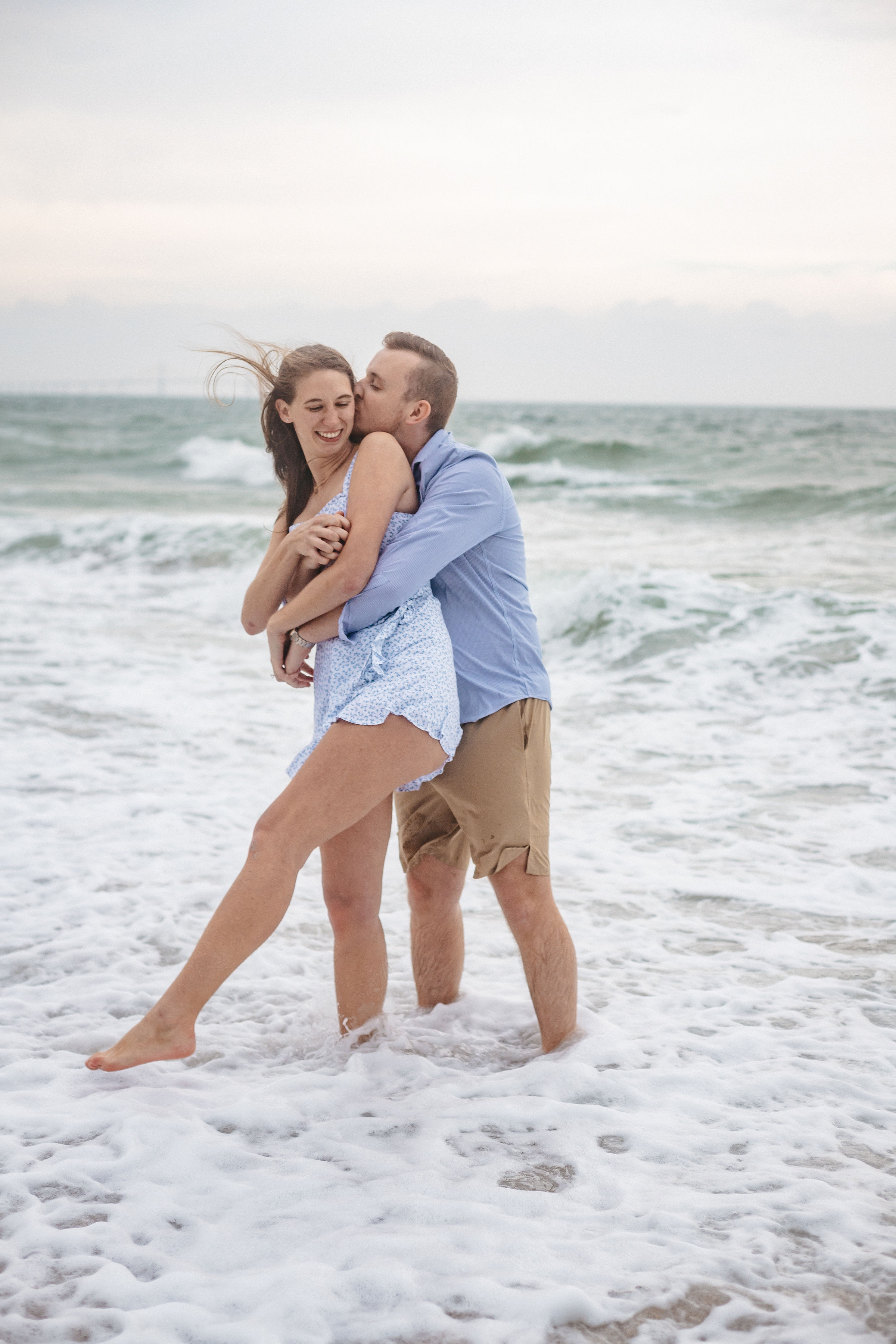 Couple playing on the see water for photoshoot | Wedding Photography | Cherished memories studio