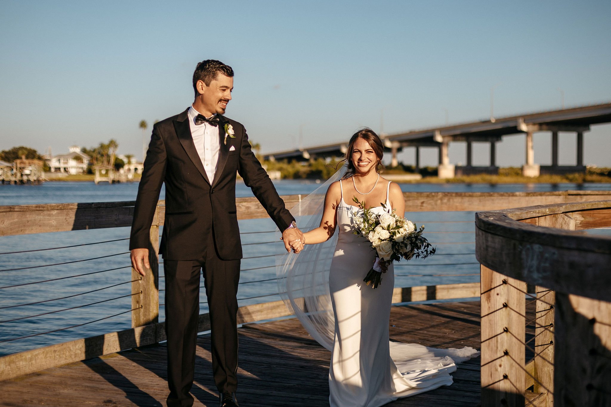 wedding photography | Groom and bride walking on the bridge | Cherished Memories Studio