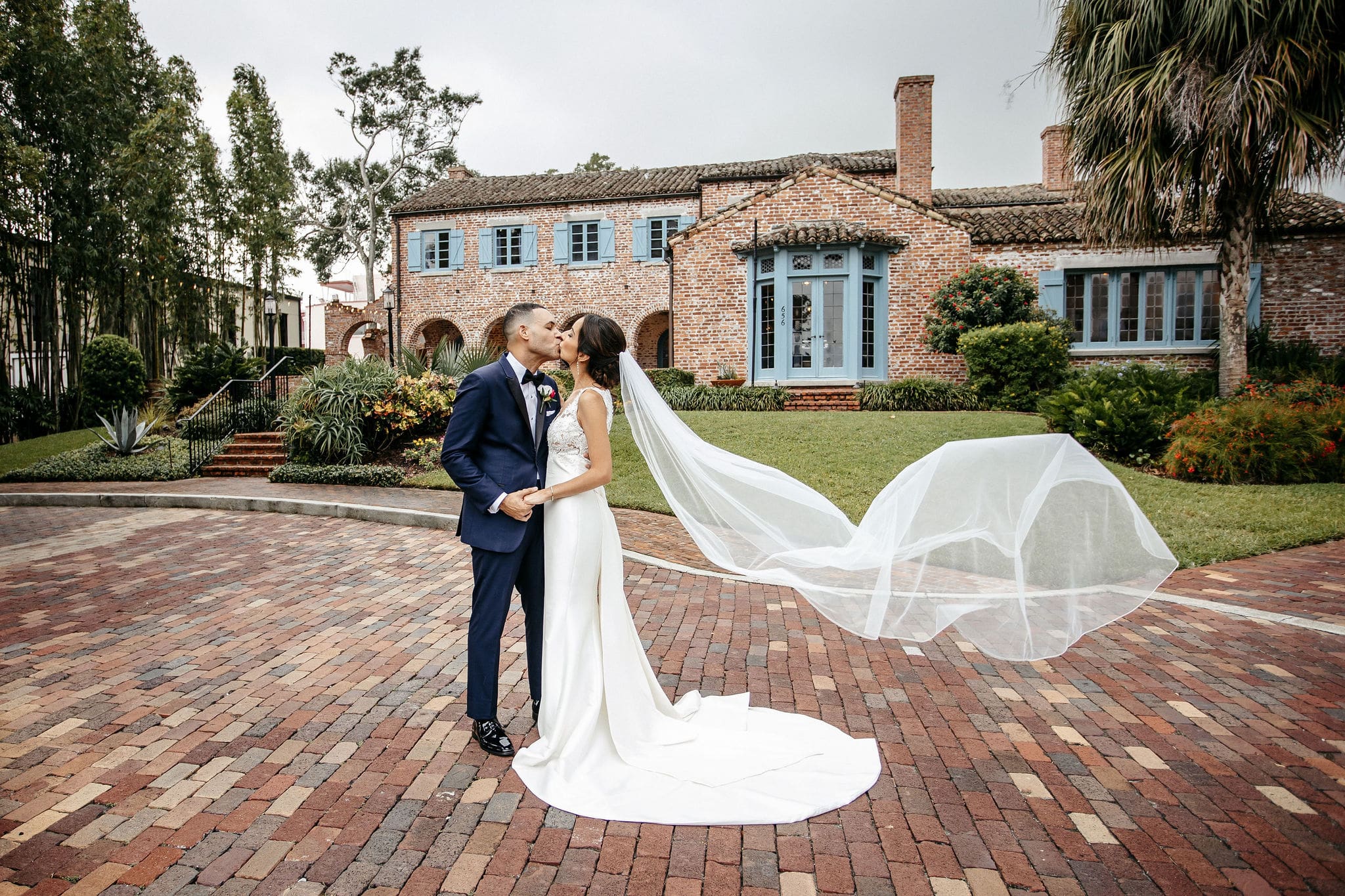 Newly wed kissing in Florida | Cherished Memories Studio