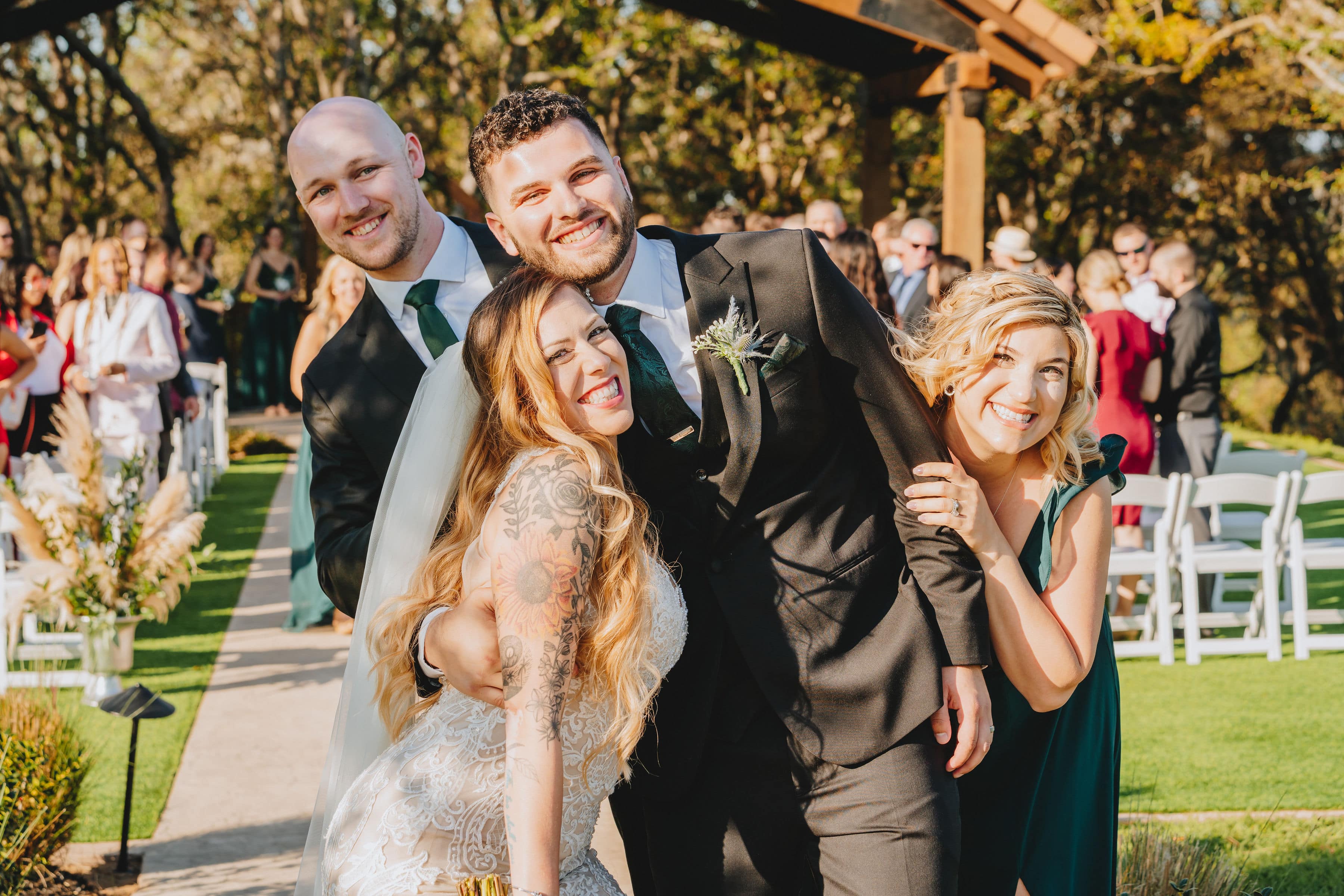 Newly wed with their guests posing for a pic | Cherished Memories Studio