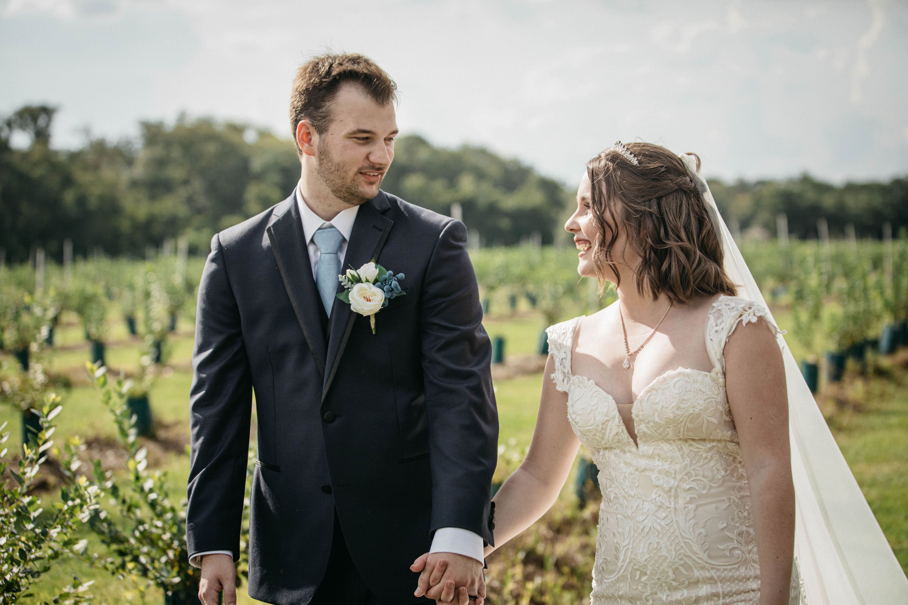 Bride and groom looking at each other | Cherished Memories Studio
