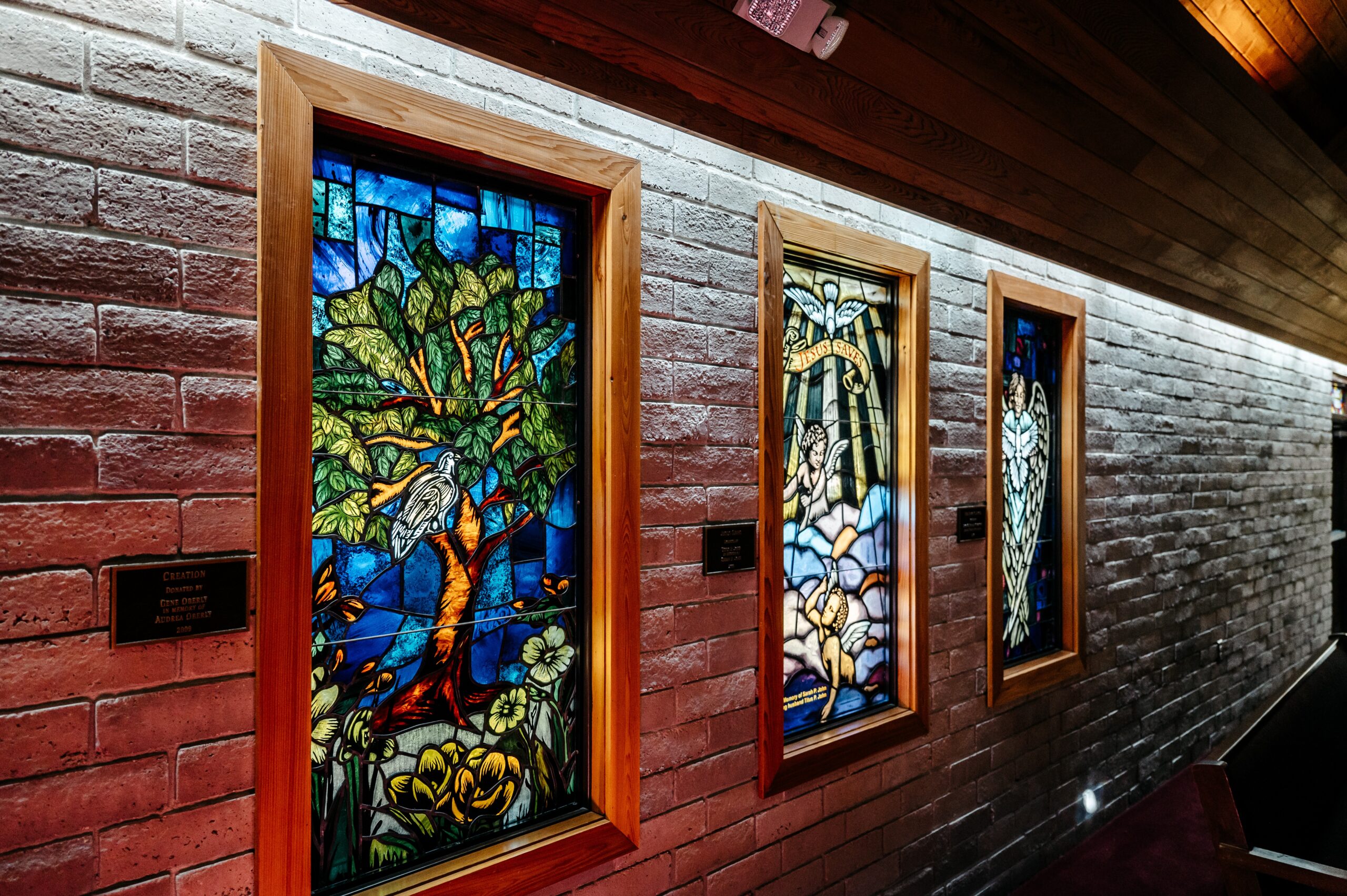 Three stained glass windows decorate the hall for altamonte chapel photos