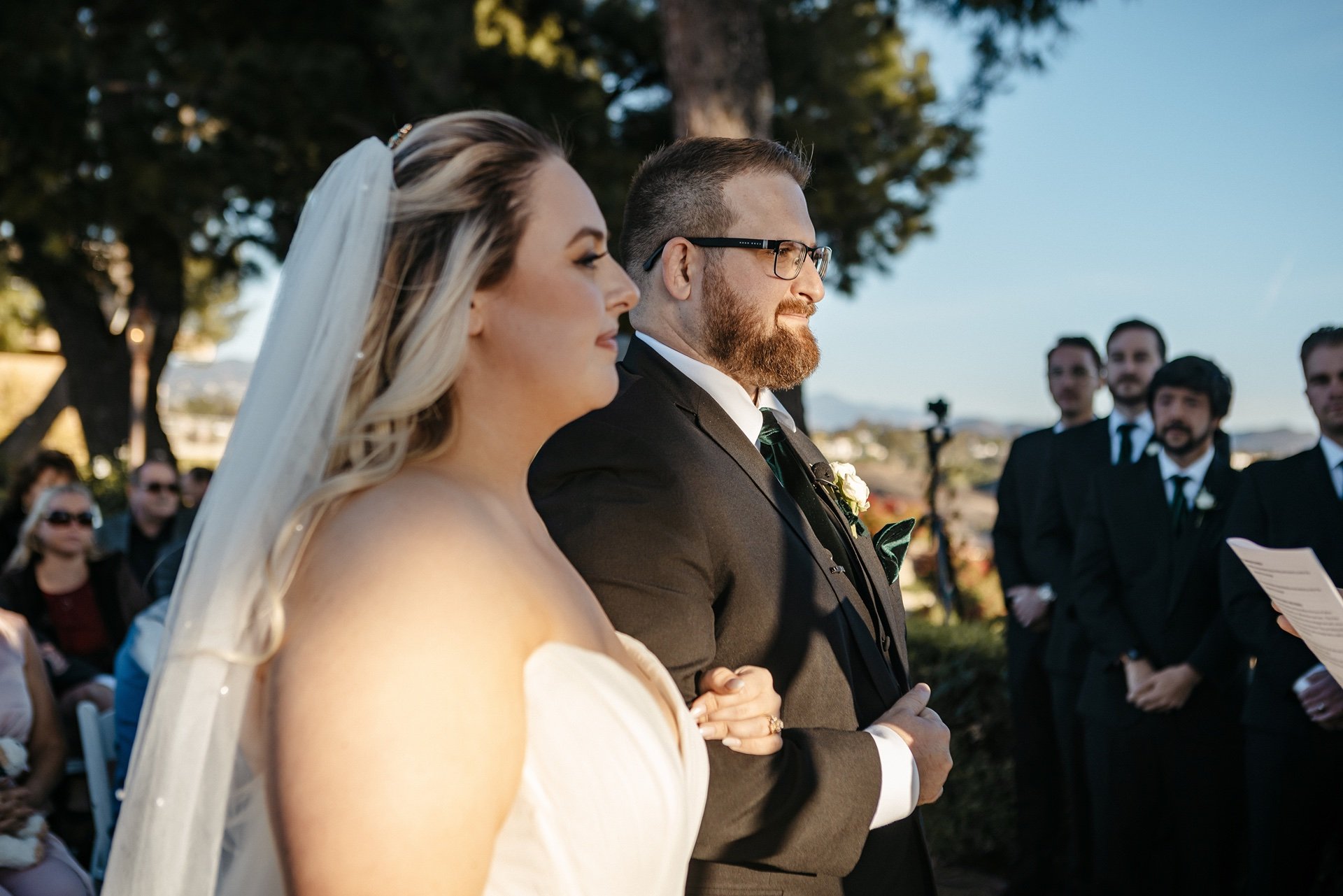 Bride and groom stand at the altar preparing to say I do in front of their family and friends in Central Florida