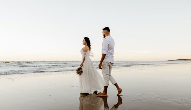 Groom smiling behind his bride | Wedding Photography | Cherished memories studio