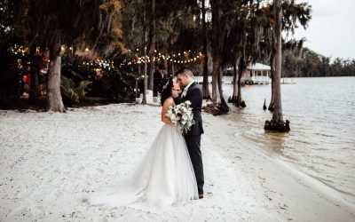 Couple at their Paradise Cove waterfront wedding in Orlando