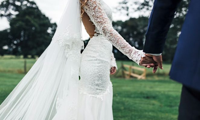 Newlywed couple holding hands | Wedding Photography | Cherished memories studio