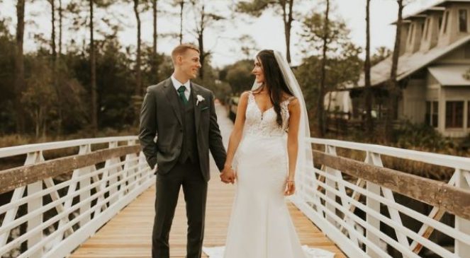 Married couple posing on the bridge | Wedding Photography | Cherished memories studio